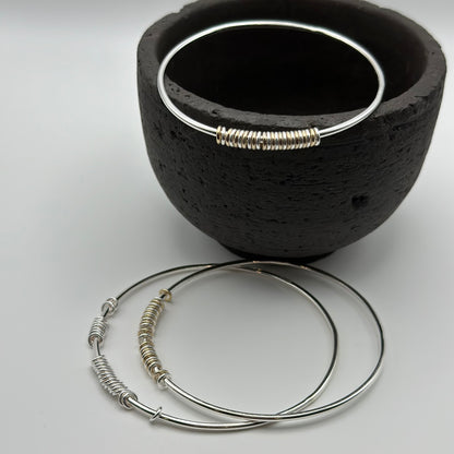 Silver and gold anxiety relief bangles